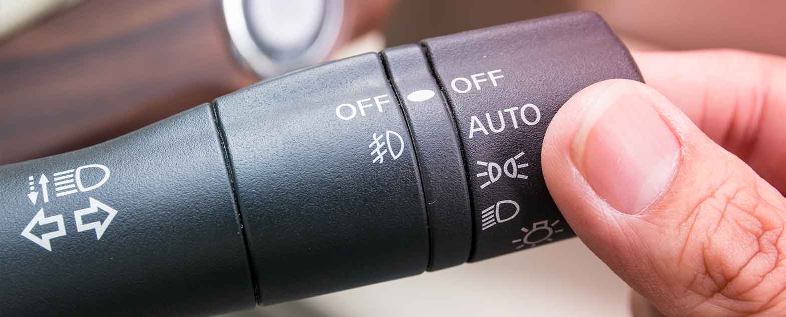 A car headlight control stalk with daytime running light controls